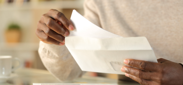 Person opening their mail